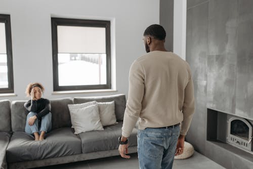 Man taking care of a sick woman at home