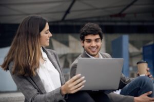 people-with-laptop-outdoors-medium-shot