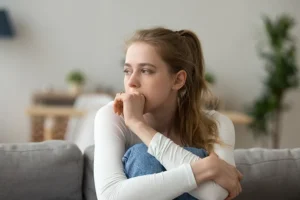 girl-sitting-on-couch