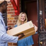 Photo by Mizuno K: https://www.pexels.com/photo/smiling-woman-receiving-package-from-courier-13443801/