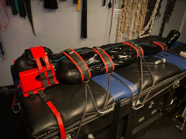 Leather Harnesses, Jockstraps, and Sleepsack Bondage in BDSM