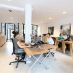 Modern office space of ESSD Consulting team collaborating on e-commerce and digital marketing projects.