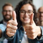 Group of people giving thumbs up