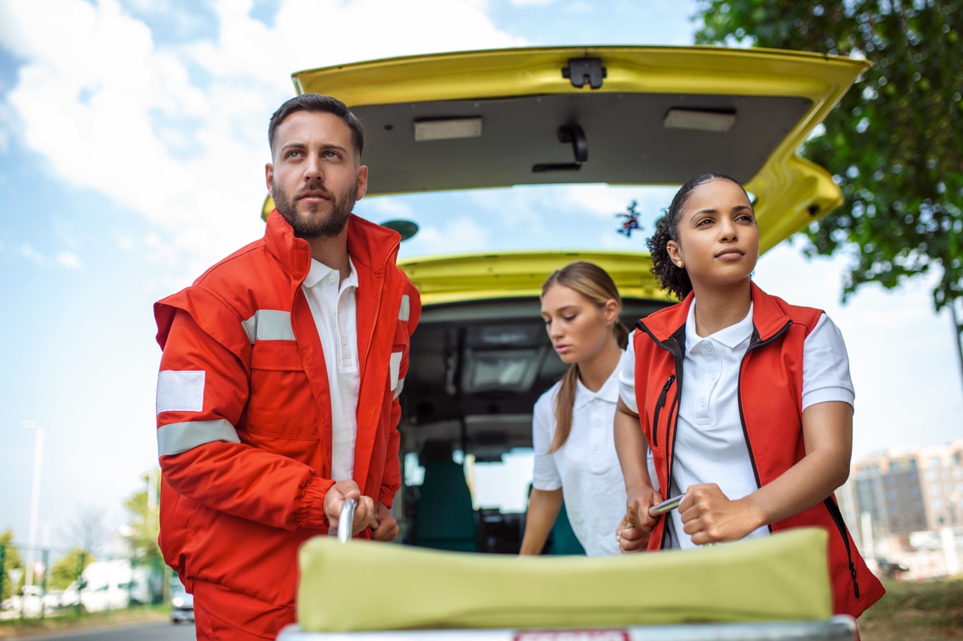 Paramedics calmly exiting an ambulance