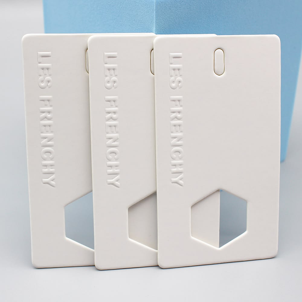 custom embossed hang tags with logos