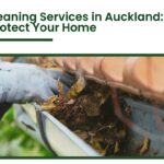 Professional gutter cleaning service in Auckland removing leaves and debris from roof gutters