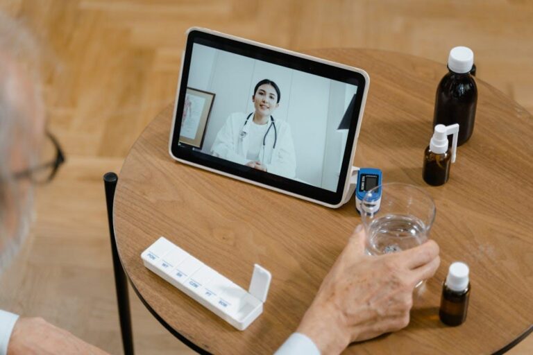 A person attending a doctor’s appointment online