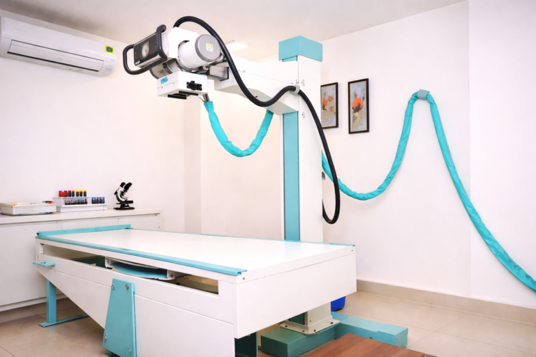 Modern X-ray room in a pathology lab with advanced digital radiology machine and patient examination table