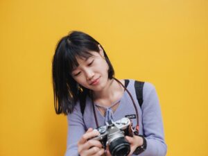 A person holding a camera