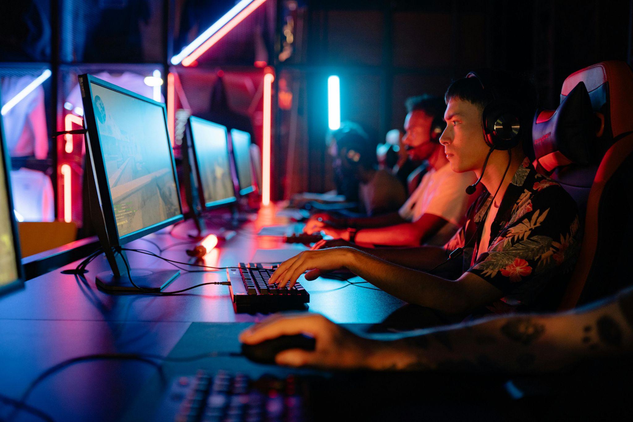 Two players concentrating seriously on their sweepstakes gameplay