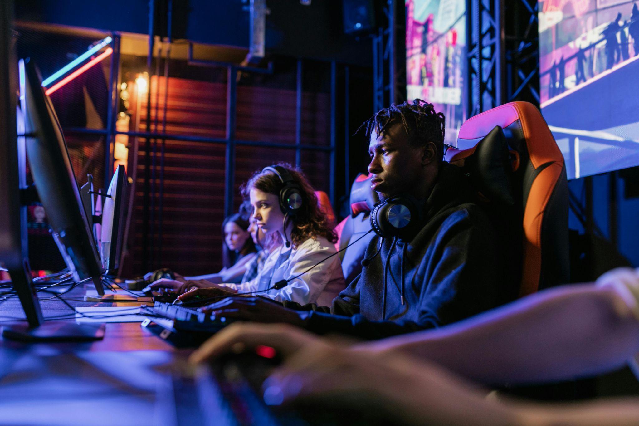 Two players concentrated on their gameplay