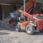 loader-transporting-soil-waste-materials-waste-treatment-plant_181624-47747