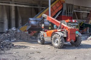 loader-transporting-soil-waste-materials-waste-treatment-plant_181624-47747