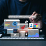 A professional interacting with a digital holographic dashboard demonstrating effective B2B content marketing strategies with analytics, charts, and growth icons over a desk setup.
