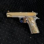 Colt 45 ACP featuring a two-tone 24K gold slide with polished stainless steel