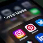 Social media apps displayed on a smartphone screen