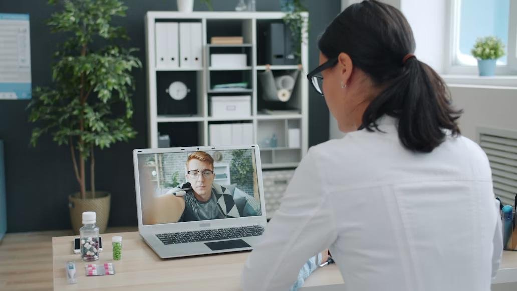 An image of a doctor having an online consultation with a patient