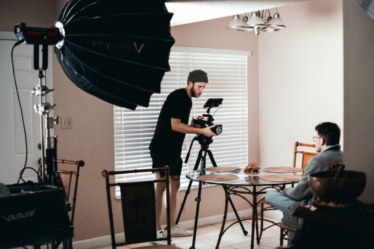 a guy setting up the right angles on his camera.