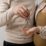 couple holding the keys to their new house