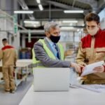 imgi_12_mid-adult-engineer-male-worker-wearing-face-masks-while-examining-paperwork-woodworking-factory_637285-11899