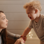 mother and son looking at each other