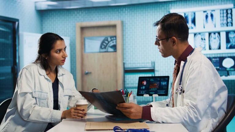 physician-meeting-with-patient-discuss-medical-test-results-cabinet-90kb