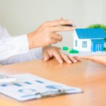 Real estate broker agent presenting and consult to customer to d